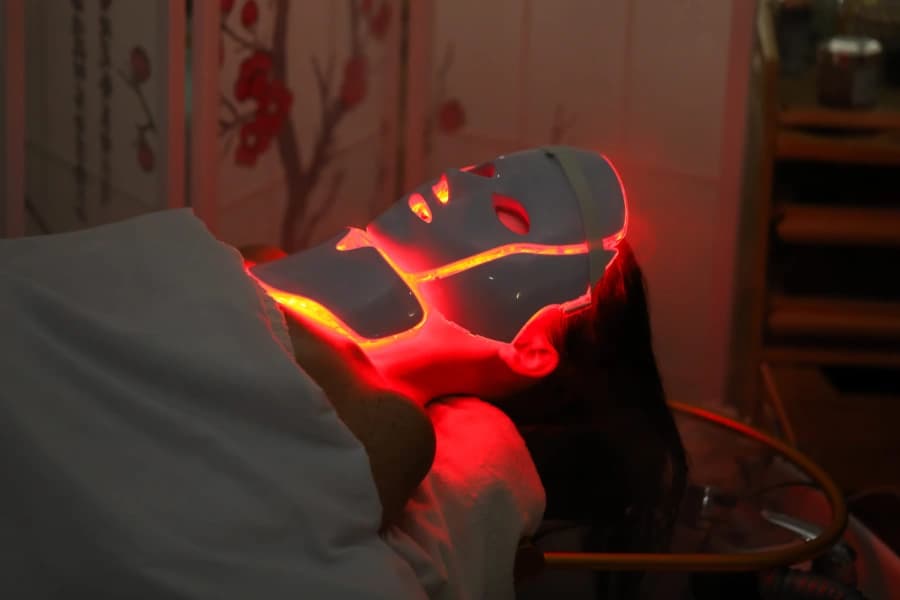 LED light therapy facial treatment with red and blue light technology